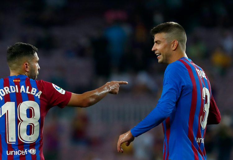 Gerard Pique has scored an early goal to give Barcelona the lead during La Liga season opener against Real Sociedad